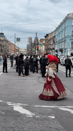 Nevsky Prospekt buzzes on a cloudy Saint Petersburg afternoon