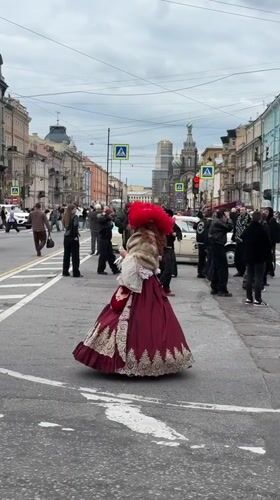 Nevsky Prospekt buzzes on a cloudy Saint Petersburg afternoon