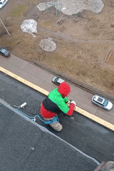 Rooftop documentation session captures cityscape views in Chaikovsky, Russia
