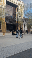 Street musicians perform outside library in downtown Orenburg