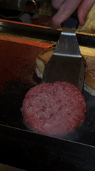 Burgers on the grill and a surreal concrete floor moment in Tbilisi
