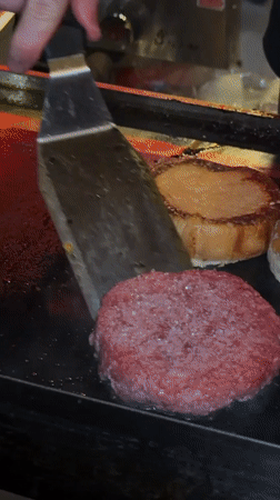 Burgers on the grill and a surreal concrete floor moment in Tbilisi