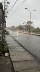 Heavy rain creates wet conditions on Lhokseumawe street