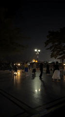 Group dances on waterfront terrace in Xiangzhou, China