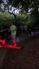 Evening outdoor event with DJ and runners in Luxembourg park