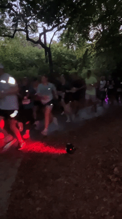 Evening outdoor event with DJ and runners in Luxembourg park