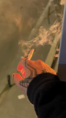 Person smoking cigarette captured in Şişli, Istanbul