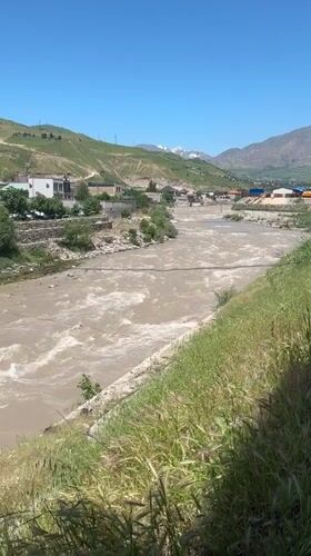 Rapid muddy river flow observed near Dushanbe, Tajikistan
