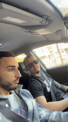 Men filming inside car in Plovdiv, Bulgaria