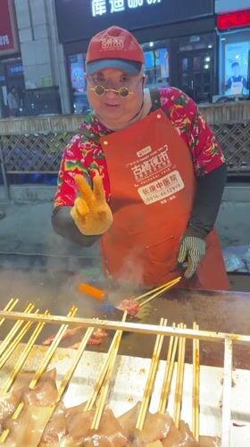 Evening street food market operates under decorative lights in Guta