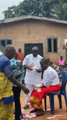 Outdoor gathering with money activity observed in Eziudo, Nigeria
