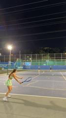 Evening tennis match and curious dog spotted in Tel-Aviv