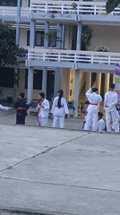 Martial arts demo at dusk outside Đà Lạt's Hermann Gmeiner School