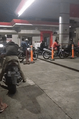 Evening refueling stop at a Pertamina station in Ngempon