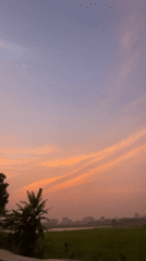 Colorful sunset captured across Dhaka skyline