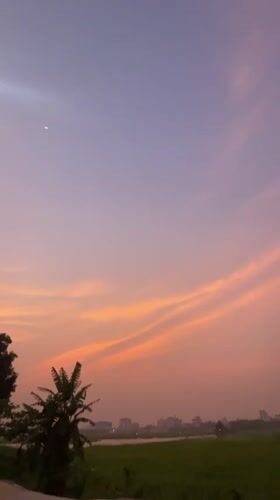 Colorful sunset captured across Dhaka skyline