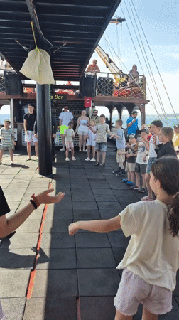 Children participate in organized activity aboard boat in Alanya