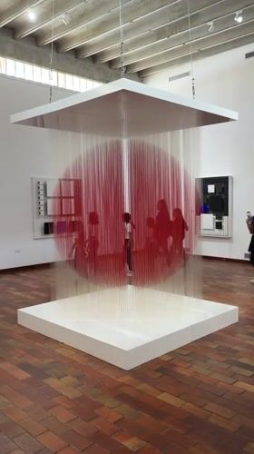 Art museum tour guides children through contemporary installations