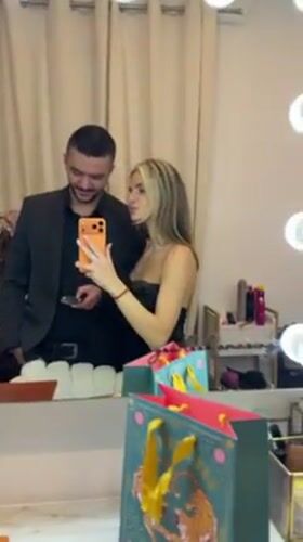 Couple documents evening out in Berlin with mirror selfies