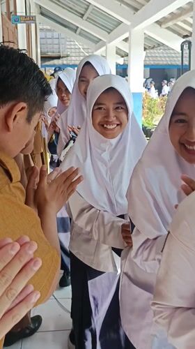 Indonesian students gather for school ceremony in Karangtengah