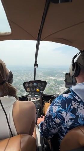 Inside a helicopter cabin flying over New York
