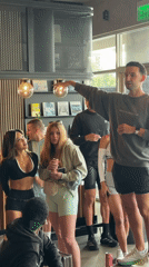 Man addresses group at West Hollywood cafe gathering