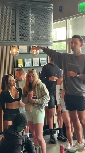 Man addresses group at West Hollywood cafe gathering