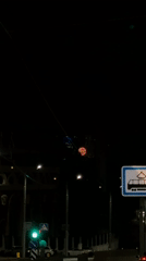 Possible fire creates pink glow over Minsk building