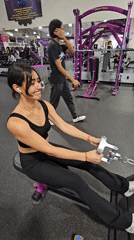 Women exercise at Puebla gym using various fitness equipment