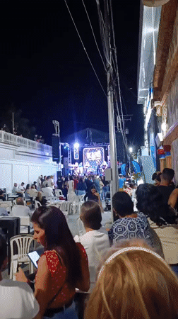 Nighttime outdoor concert draws crowd in Juan Griego, Venezuela
