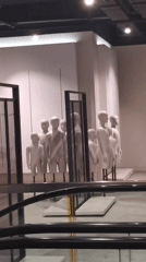 Child-sized mannequins on display in a retail store