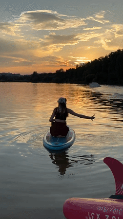 Paddleboard session on a Minsk lake at golden hour