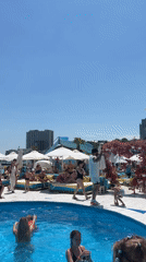 Sunny summer day at Odesa's pool clubs and streets