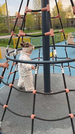 Families enjoy afternoon playground time in Reshetnikovo