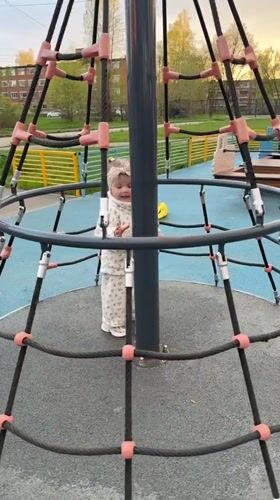 Families enjoy afternoon playground time in Reshetnikovo
