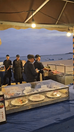 Evening beach leisure activities documented in Denpasar, Indonesia