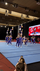 Cheerleading team performs routine in Khimki indoor arena
