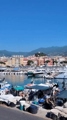 Sanremo harbor and coastline on a clear summer morning