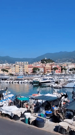 Sanremo harbor and coastline on a clear summer morning