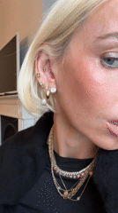 Woman with blonde hair, piercings recorded in London