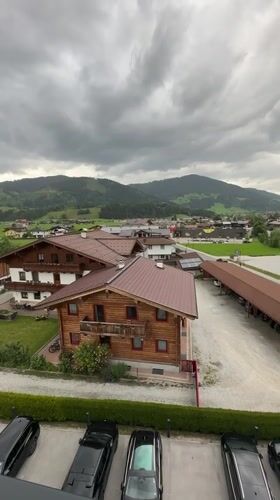 Balcony afternoon in Flachau with valley views and fresh fruit