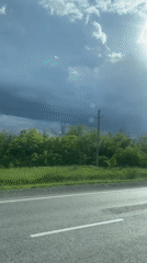 Highway drive captured under partly cloudy skies near Kangly