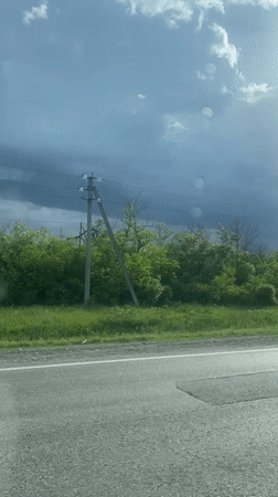 Highway drive captured under partly cloudy skies near Kangly
