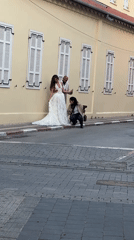 Bridal photoshoot captured on Tel Aviv cobblestone street