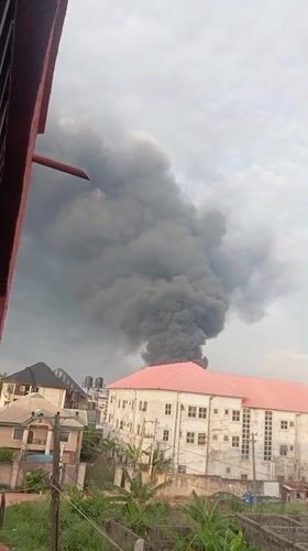 Dark smoke plume rises over Nkpor, Nigeria skyline