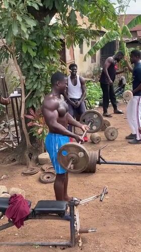 Men work out at makeshift outdoor gym in Akwanga