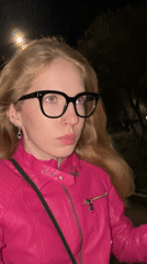 Woman in pink jacket observed on Izhevsk street at night