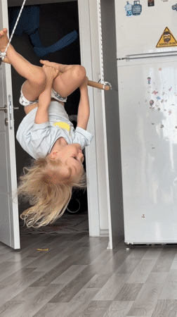 Woman photographed drinking, wearing headphones in Fethiye Turkey