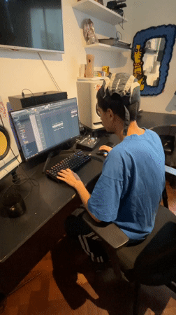 Music producer spotted working at computer in Buenos Aires