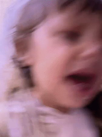 Child's emotional moments captured indoors in Kandahar